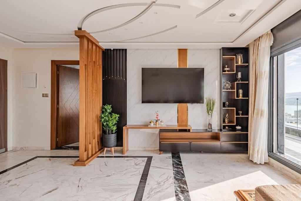 Royale Duplexe Pleine Centre Tanger Apartment Bagian luar foto
